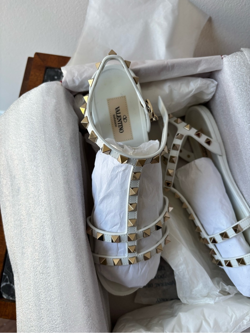 Valentino White T‑Strap Rockstud Sandals with Gold Pyramid Studs